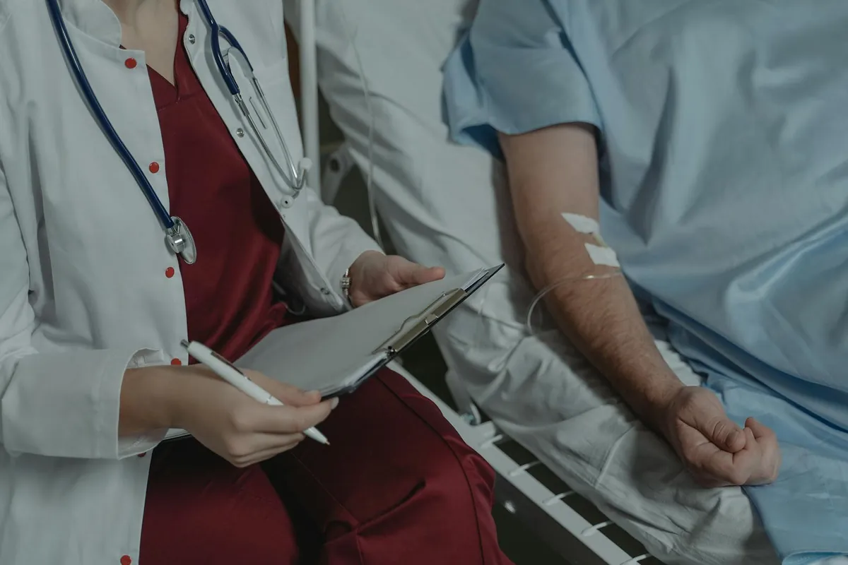 Doctor examining a patient during consultation